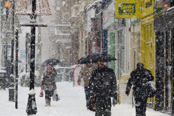 John Lewis and Next winter warmers sales skyrocket as snow falls John Lewis and Next winter warmers sales skyrocket as snow falls